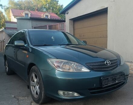 Зеленый Тойота Камри, объемом двигателя 2.4 л и пробегом 225 тыс. км за 5300 $, фото 1 на Automoto.ua