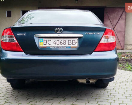 Зеленый Тойота Камри, объемом двигателя 2.4 л и пробегом 430 тыс. км за 4999 $, фото 1 на Automoto.ua