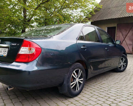 Зеленый Тойота Камри, объемом двигателя 2.4 л и пробегом 430 тыс. км за 4999 $, фото 6 на Automoto.ua