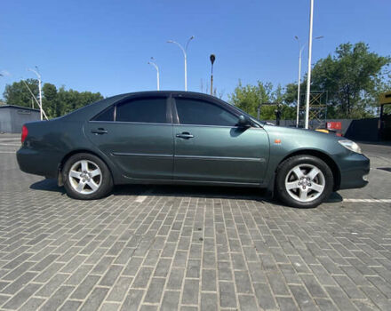 Зелений Тойота Камрі, об'ємом двигуна 2.4 л та пробігом 256 тис. км за 6000 $, фото 5 на Automoto.ua