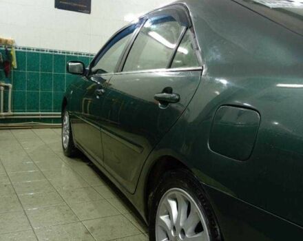 Зеленый Тойота Камри, объемом двигателя 2.4 л и пробегом 260 тыс. км за 3900 $, фото 1 на Automoto.ua