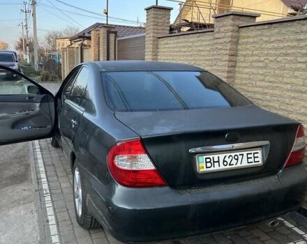 Зеленый Тойота Камри, объемом двигателя 2.4 л и пробегом 318 тыс. км за 3600 $, фото 3 на Automoto.ua