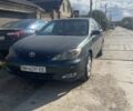 Зеленый Тойота Камри, объемом двигателя 2.4 л и пробегом 318 тыс. км за 3600 $, фото 1 на Automoto.ua