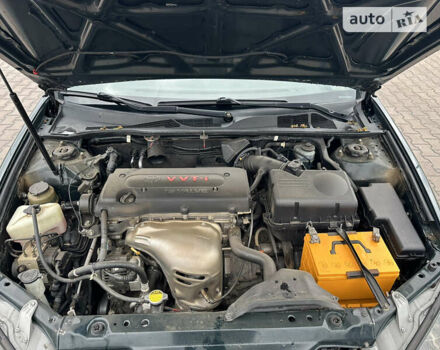 Зеленый Тойота Камри, объемом двигателя 2.4 л и пробегом 429 тыс. км за 5999 $, фото 26 на Automoto.ua