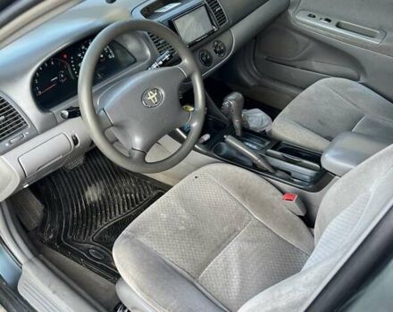 Зеленый Тойота Камри, объемом двигателя 2.4 л и пробегом 318 тыс. км за 3600 $, фото 1 на Automoto.ua