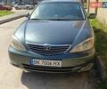 Зеленый Тойота Камри, объемом двигателя 3 л и пробегом 350 тыс. км за 3500 $, фото 1 на Automoto.ua