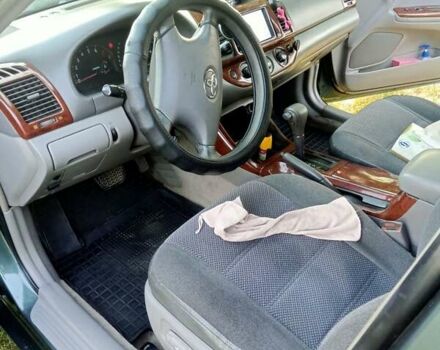 Зелений Тойота Камрі, об'ємом двигуна 2.36 л та пробігом 270 тис. км за 5300 $, фото 6 на Automoto.ua