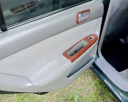 Зелений Тойота Камрі, об'ємом двигуна 2.36 л та пробігом 270 тис. км за 5300 $, фото 4 на Automoto.ua