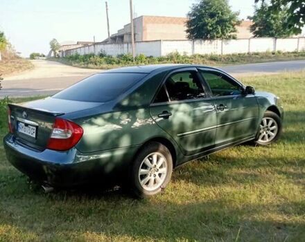 Зелений Тойота Камрі, об'ємом двигуна 2.36 л та пробігом 270 тис. км за 5300 $, фото 10 на Automoto.ua