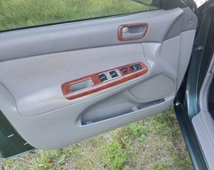 Зелений Тойота Камрі, об'ємом двигуна 2.36 л та пробігом 270 тис. км за 5300 $, фото 5 на Automoto.ua