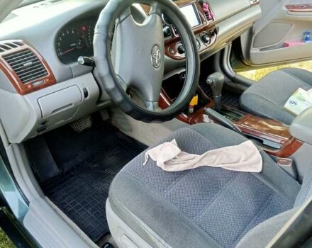 Зелений Тойота Камрі, об'ємом двигуна 2.36 л та пробігом 270 тис. км за 5300 $, фото 7 на Automoto.ua