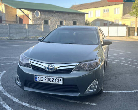 Зелений Тойота Камрі, об'ємом двигуна 2.49 л та пробігом 259 тис. км за 13000 $, фото 1 на Automoto.ua