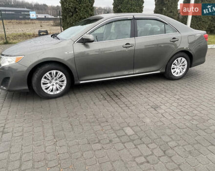 Зелений Тойота Камрі, об'ємом двигуна 2.49 л та пробігом 197 тис. км за 10400 $, фото 3 на Automoto.ua