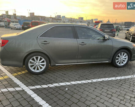 Зелений Тойота Камрі, об'ємом двигуна 2.49 л та пробігом 100 тис. км за 13500 $, фото 1 на Automoto.ua
