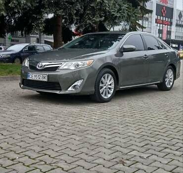 Зеленый Тойота Камри, объемом двигателя 2.5 л и пробегом 230 тыс. км за 11300 $, фото 3 на Automoto.ua