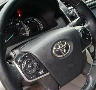 Зеленый Тойота Камри, объемом двигателя 2.5 л и пробегом 230 тыс. км за 11300 $, фото 20 на Automoto.ua