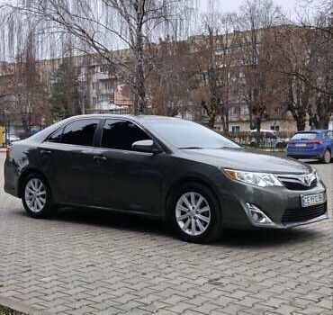 Зеленый Тойота Камри, объемом двигателя 2.5 л и пробегом 230 тыс. км за 11300 $, фото 5 на Automoto.ua