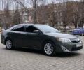 Зеленый Тойота Камри, объемом двигателя 2.5 л и пробегом 230 тыс. км за 11300 $, фото 5 на Automoto.ua