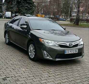 Зеленый Тойота Камри, объемом двигателя 2.5 л и пробегом 230 тыс. км за 11300 $, фото 8 на Automoto.ua