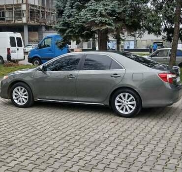 Зеленый Тойота Камри, объемом двигателя 2.5 л и пробегом 230 тыс. км за 11300 $, фото 2 на Automoto.ua