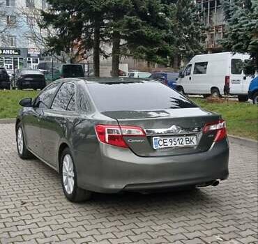 Зеленый Тойота Камри, объемом двигателя 2.5 л и пробегом 230 тыс. км за 11300 $, фото 10 на Automoto.ua