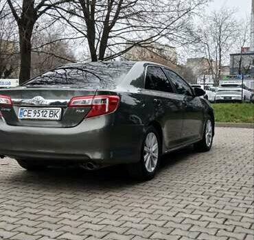 Зеленый Тойота Камри, объемом двигателя 2.5 л и пробегом 230 тыс. км за 11300 $, фото 6 на Automoto.ua