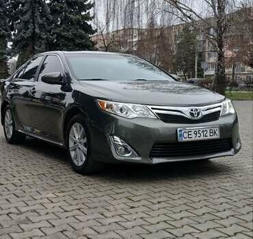 Зеленый Тойота Камри, объемом двигателя 2.5 л и пробегом 230 тыс. км за 11300 $, фото 4 на Automoto.ua