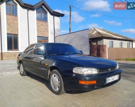 Зеленый Тойота Камри, объемом двигателя 3 л и пробегом 347 тыс. км за 2800 $, фото 1 на Automoto.ua