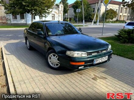 Зелений Тойота Камрі, об'ємом двигуна 2.2 л та пробігом 235 тис. км за 2100 $, фото 1 на Automoto.ua