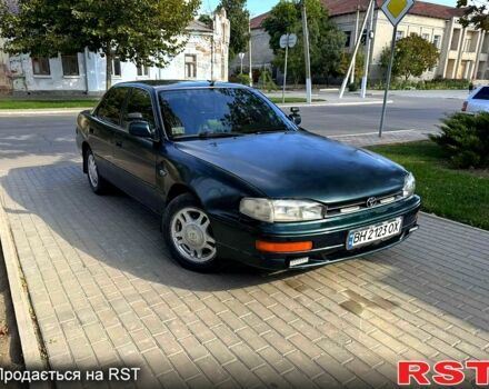 Зеленый Тойота Камри, объемом двигателя 2.2 л и пробегом 235 тыс. км за 2100 $, фото 1 на Automoto.ua