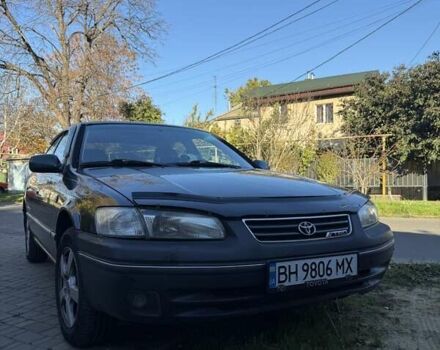 Зеленый Тойота Камри, объемом двигателя 3 л и пробегом 394 тыс. км за 3900 $, фото 1 на Automoto.ua