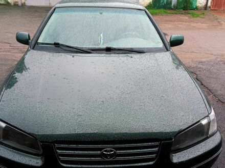 Зеленый Тойота Камри, объемом двигателя 2.2 л и пробегом 310 тыс. км за 4800 $, фото 1 на Automoto.ua