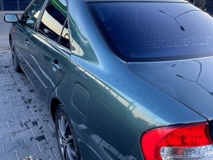 Зелений Тойота Камрі, об'ємом двигуна 3 л та пробігом 384 тис. км за 6500 $, фото 1 на Automoto.ua