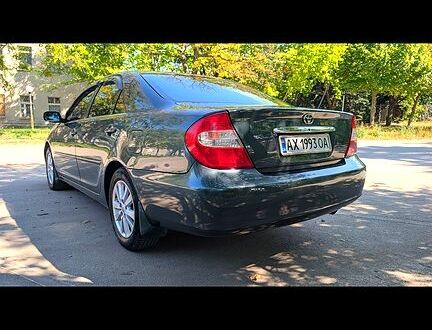 Зеленый Тойота Камри, объемом двигателя 3 л и пробегом 476 тыс. км за 6000 $, фото 1 на Automoto.ua