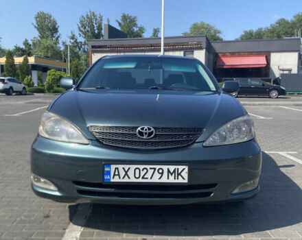 Зелений Тойота Камрі, об'ємом двигуна 2.4 л та пробігом 256 тис. км за 6000 $, фото 1 на Automoto.ua