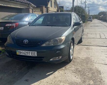 Зеленый Тойота Камри, объемом двигателя 2.4 л и пробегом 318 тыс. км за 3600 $, фото 1 на Automoto.ua