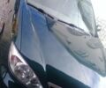 Зеленый Тойота Камри, объемом двигателя 2.4 л и пробегом 216 тыс. км за 6800 $, фото 1 на Automoto.ua