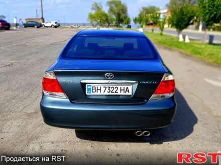 Зеленый Тойота Камри, объемом двигателя 2.4 л и пробегом 180 тыс. км за 7000 $, фото 1 на Automoto.ua