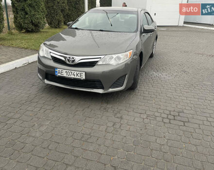 Зелений Тойота Камрі, об'ємом двигуна 2.49 л та пробігом 197 тис. км за 10400 $, фото 1 на Automoto.ua