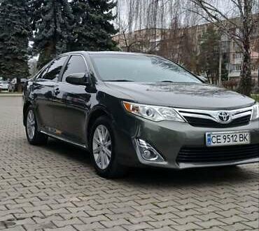 Зеленый Тойота Камри, объемом двигателя 2.5 л и пробегом 230 тыс. км за 11300 $, фото 1 на Automoto.ua