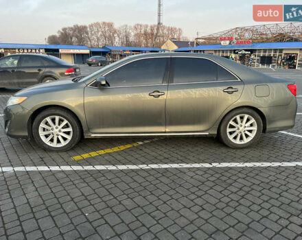 Зелений Тойота Камрі, об'ємом двигуна 2.49 л та пробігом 100 тис. км за 13500 $, фото 1 на Automoto.ua