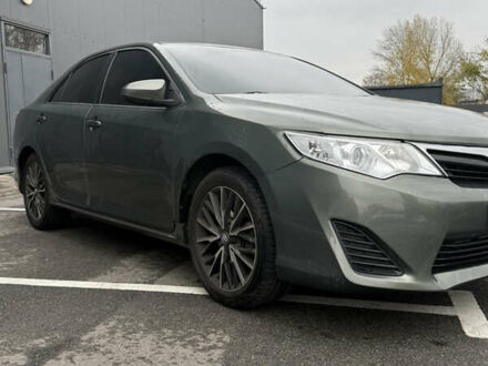 Зелений Тойота Камрі, об'ємом двигуна 2.49 л та пробігом 125 тис. км за 12800 $, фото 1 на Automoto.ua