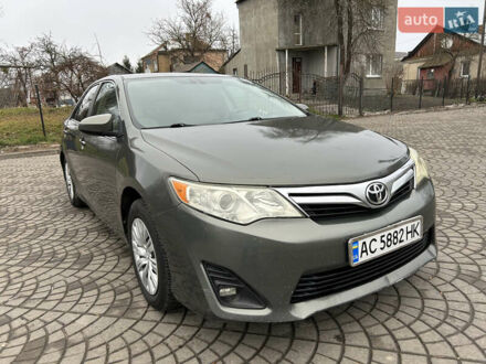 Тойота Камрі 2013 у Луцьку на Automoto.ua Зелений Тойота Камрі, об'ємом двигуна 2.49 л та пробігом 297 тис. км за 9000 $, фото 1 на Automoto.ua