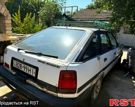 Белый Тойота Карина, объемом двигателя 2 л и пробегом 500 тыс. км за 500 $, фото 1 на Automoto.ua