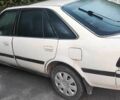 Белый Тойота Карина, объемом двигателя 2 л и пробегом 200 тыс. км за 509 $, фото 1 на Automoto.ua