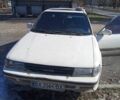 Белый Тойота Карина, объемом двигателя 2 л и пробегом 370 тыс. км за 670 $, фото 1 на Automoto.ua