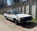 Белый Тойота Карина, объемом двигателя 1.8 л и пробегом 300 тыс. км за 670 $, фото 1 на Automoto.ua