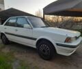 Белый Тойота Карина, объемом двигателя 1.5 л и пробегом 250 тыс. км за 800 $, фото 1 на Automoto.ua
