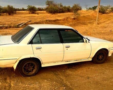 Белый Тойота Карина, объемом двигателя 1.5 л и пробегом 234 тыс. км за 600 $, фото 1 на Automoto.ua