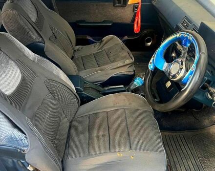 Белый Тойота Карина, объемом двигателя 1.5 л и пробегом 234 тыс. км за 600 $, фото 2 на Automoto.ua